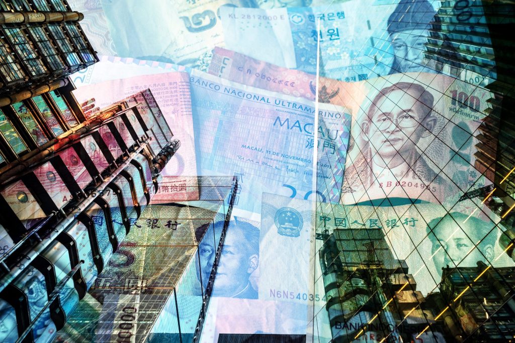 Banknotes superimposed on office blocks