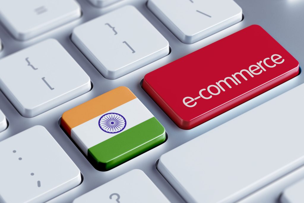 Keyboard with keys showing India flag and e-commerce button