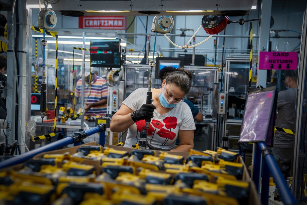 Woman working in a Stanley Black & Decker factory