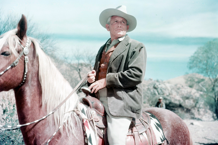 Spencer Tracy (1900-1967), US actor, on horseback, wearing a white cowboy hat, in a publicity still issued for the film, 'Broken Lance', 1954.