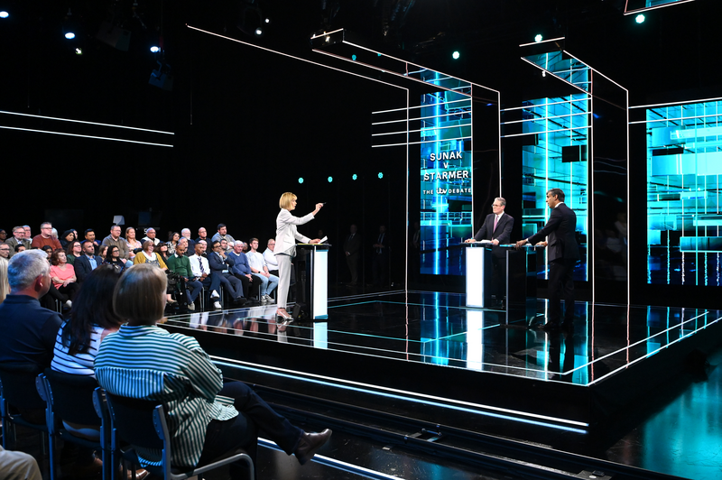 Julie Etchingham hosts Conservative Prime Minister Rishi Sunak (R) and Labour leader Sir Keir Starmer (C) during first head-to-head debate of the General Election on June 4, 2024 in Salford, England.