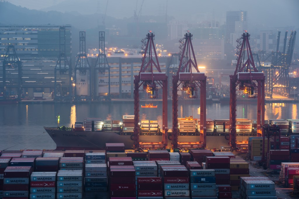 Cranes loading containers at a port