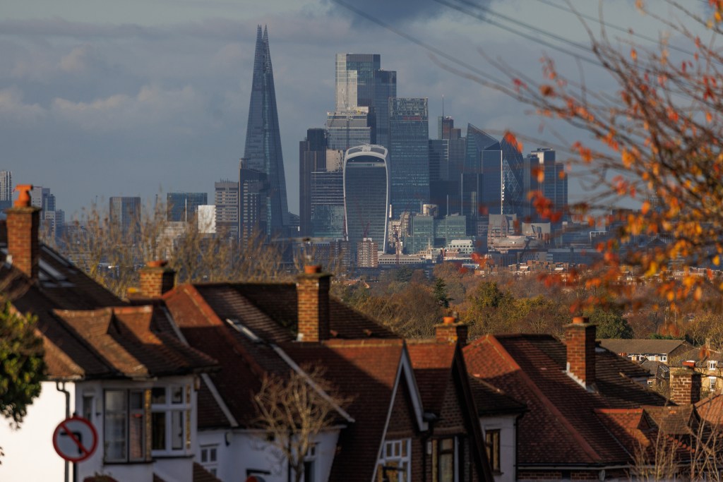 City of London skyline with domestic houses in foreground