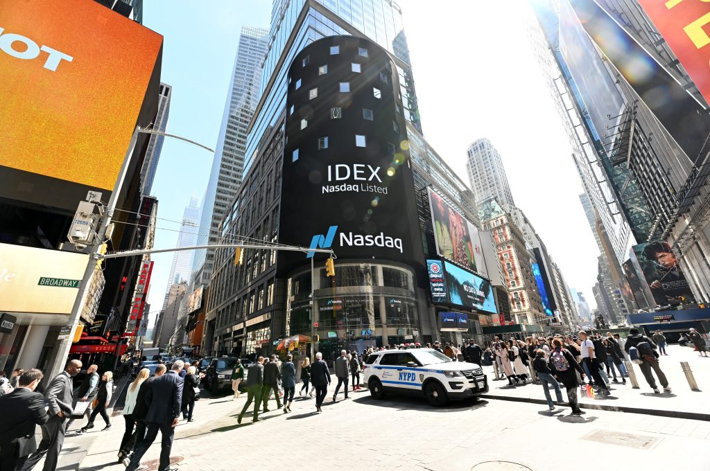 Iamge of the front of the front of the Nasdaq board in Times Square saying "IDEX," the ticker symbol for Ideanomics, Inc.