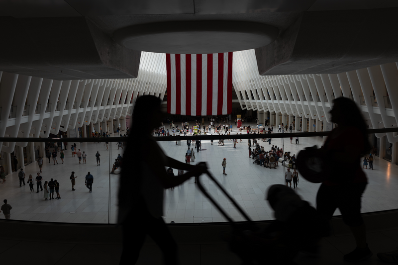 People walk through a Manhattan mall in New York Cit