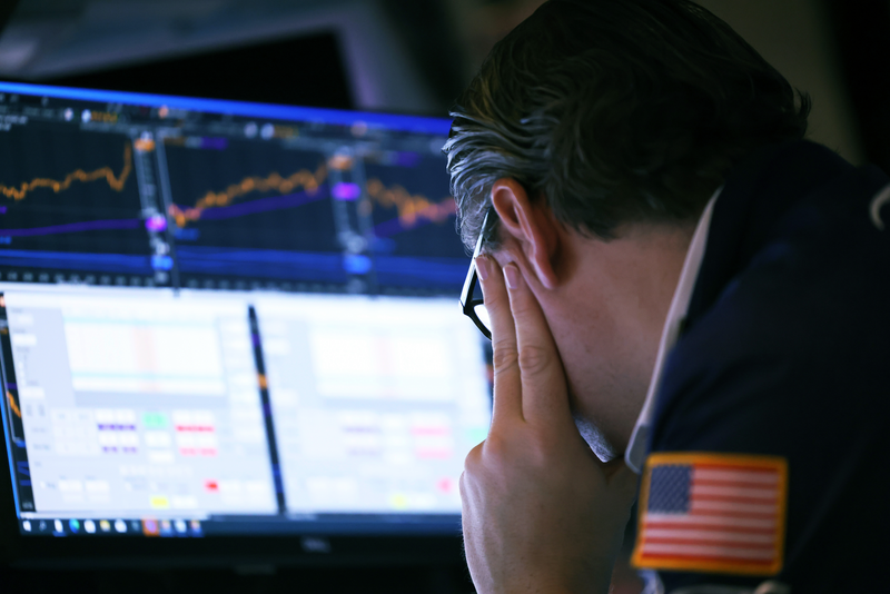 Traders work on the floor of the New York Stock Exchange.