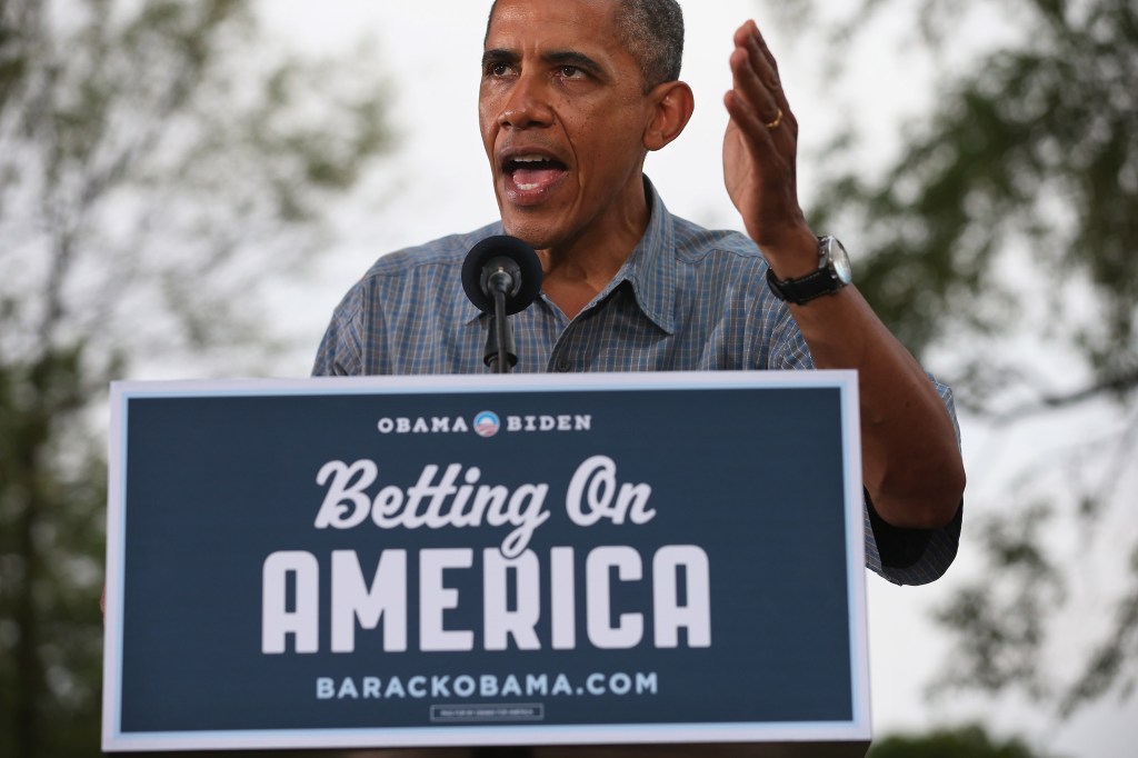 Obama with Betting on America sign