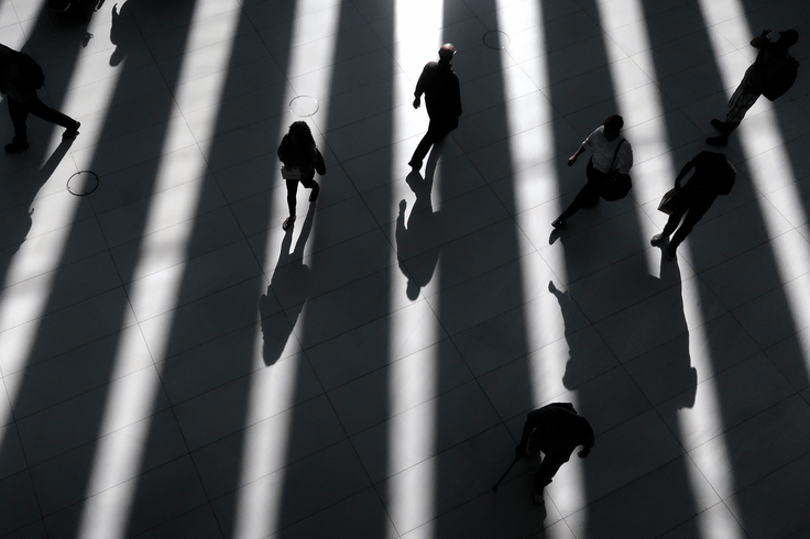 People walk through the Oculus Transit Hub at One World Trade Center.