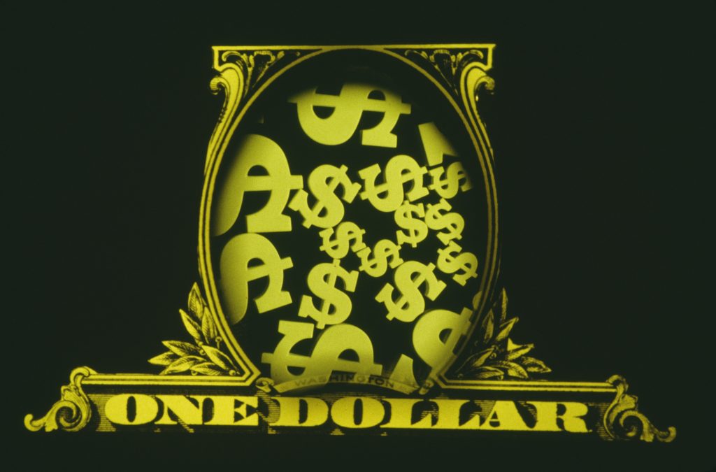 Image of dollar signs superimposed on a 1$ banknote