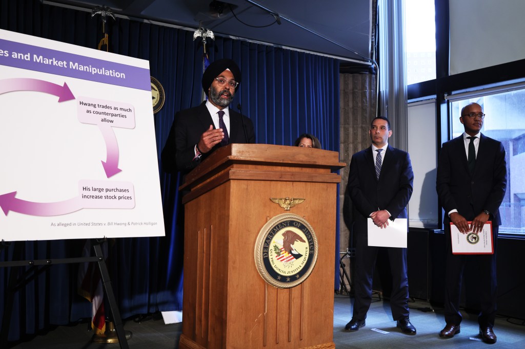 Image of Gurbir Grewal at a lectern, speaking.