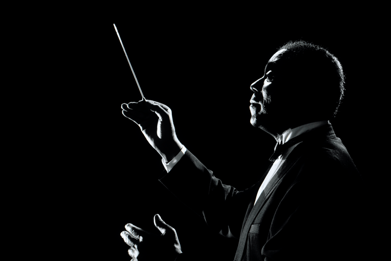 Conductor with baton.