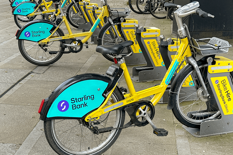 Row of bicycles for hire sponsored by Starling Bank in Manchester city centre.