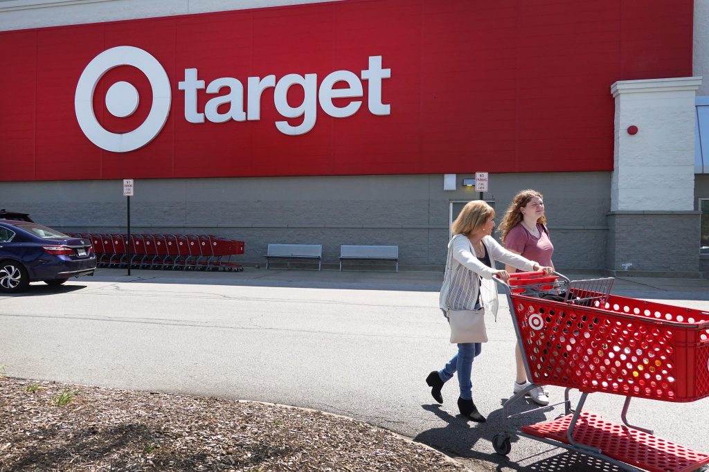 Two shoppers walking in front of Target