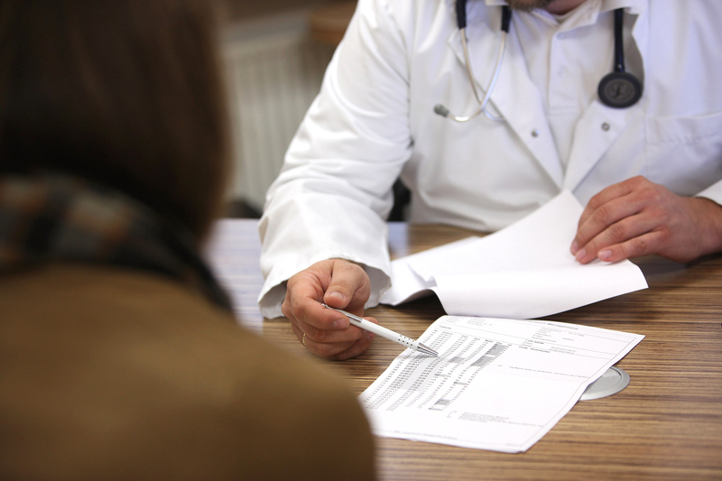 A doctor speaks with a patient.