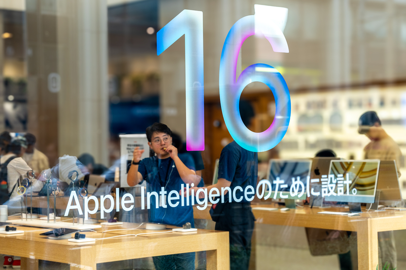 Apple Intelligence advertisement inside Shinjuku's Apple Store and iPhone 16